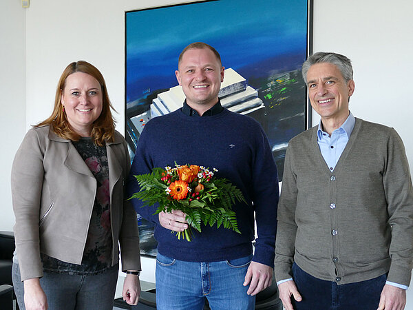 Gruppenfoto mit Frau Juncke (Personal/Organisation) sowie Herrn Huber (Personal/Organisation/Recht) und Herrn Jachens